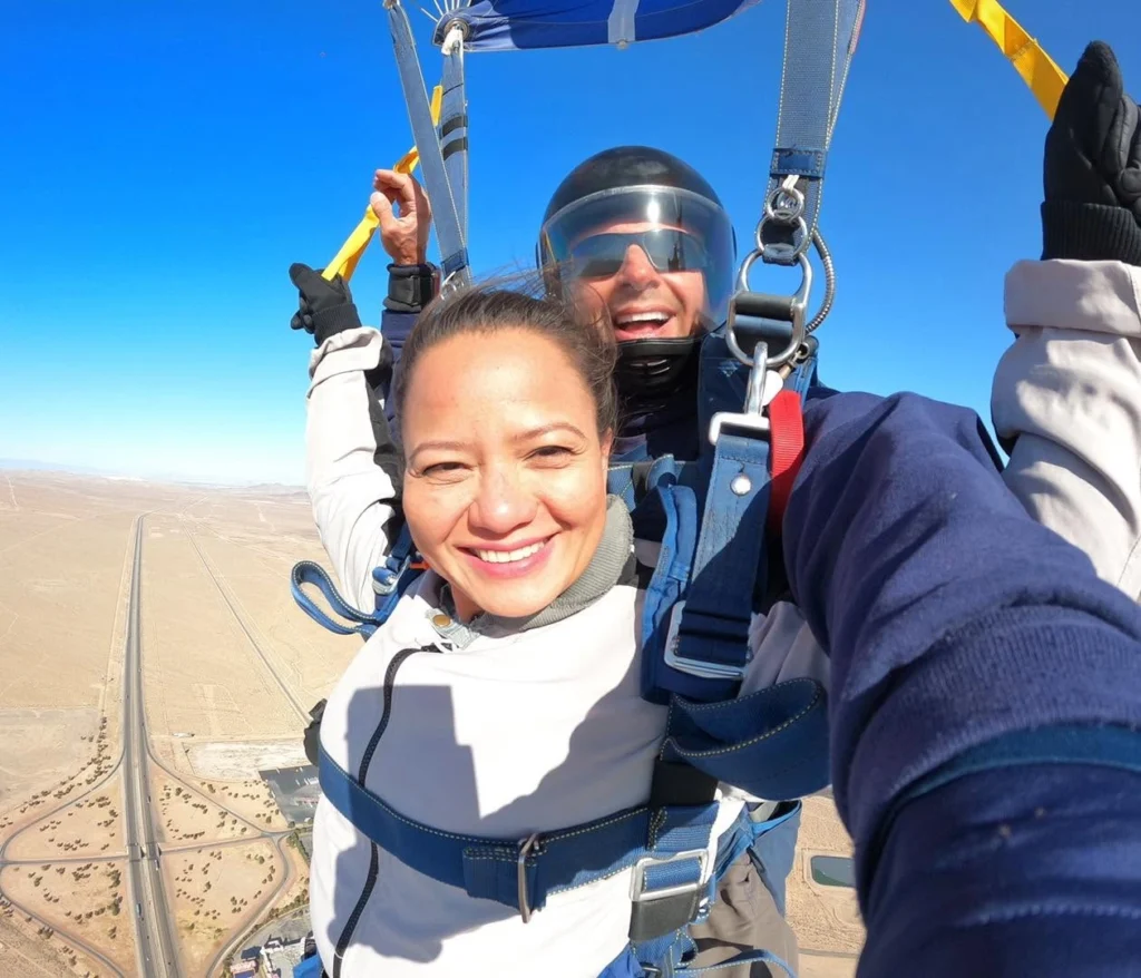 Woman tandem parachuting