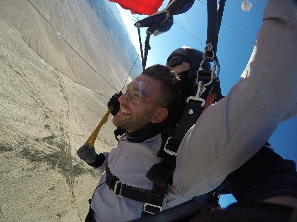 Man under parachute