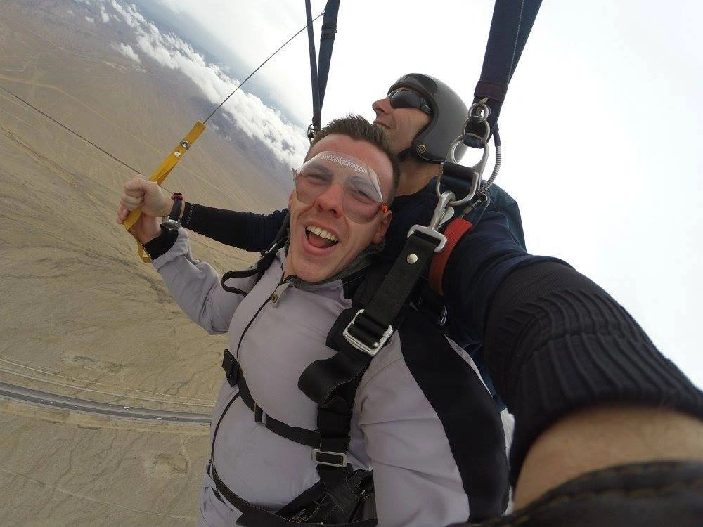 Man tandem parachuting