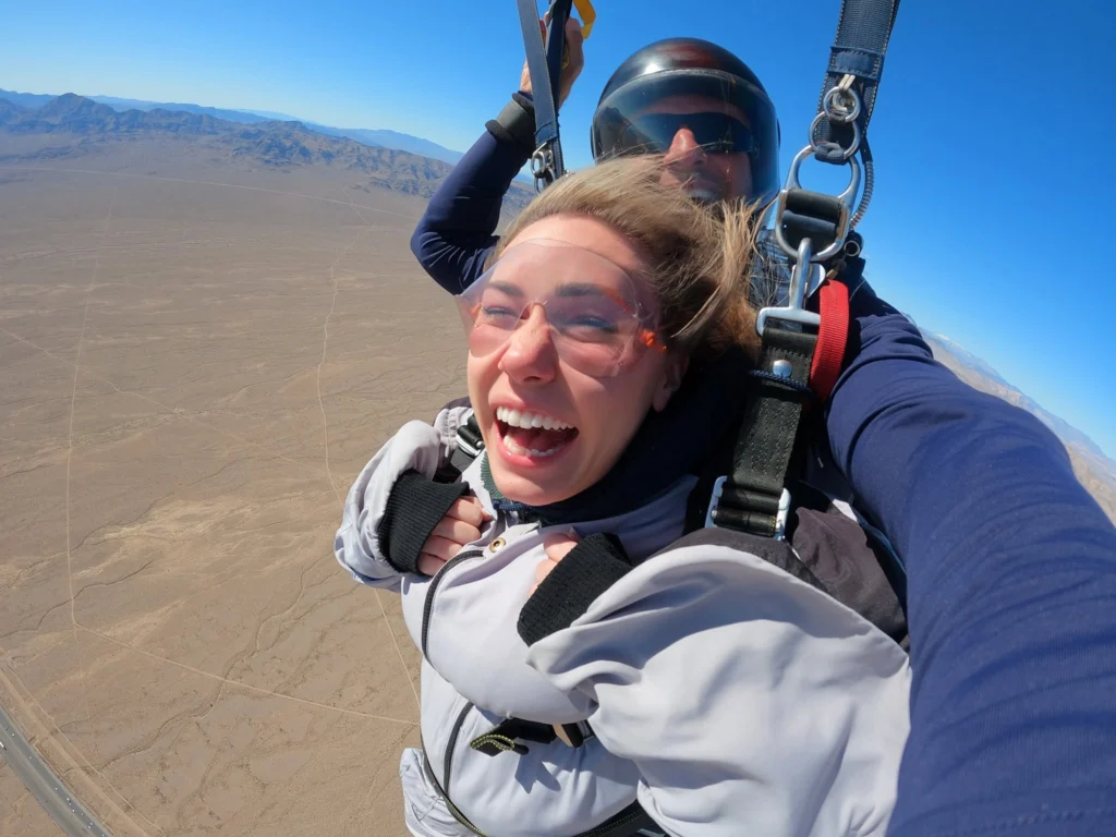 Woman tandem skydiving