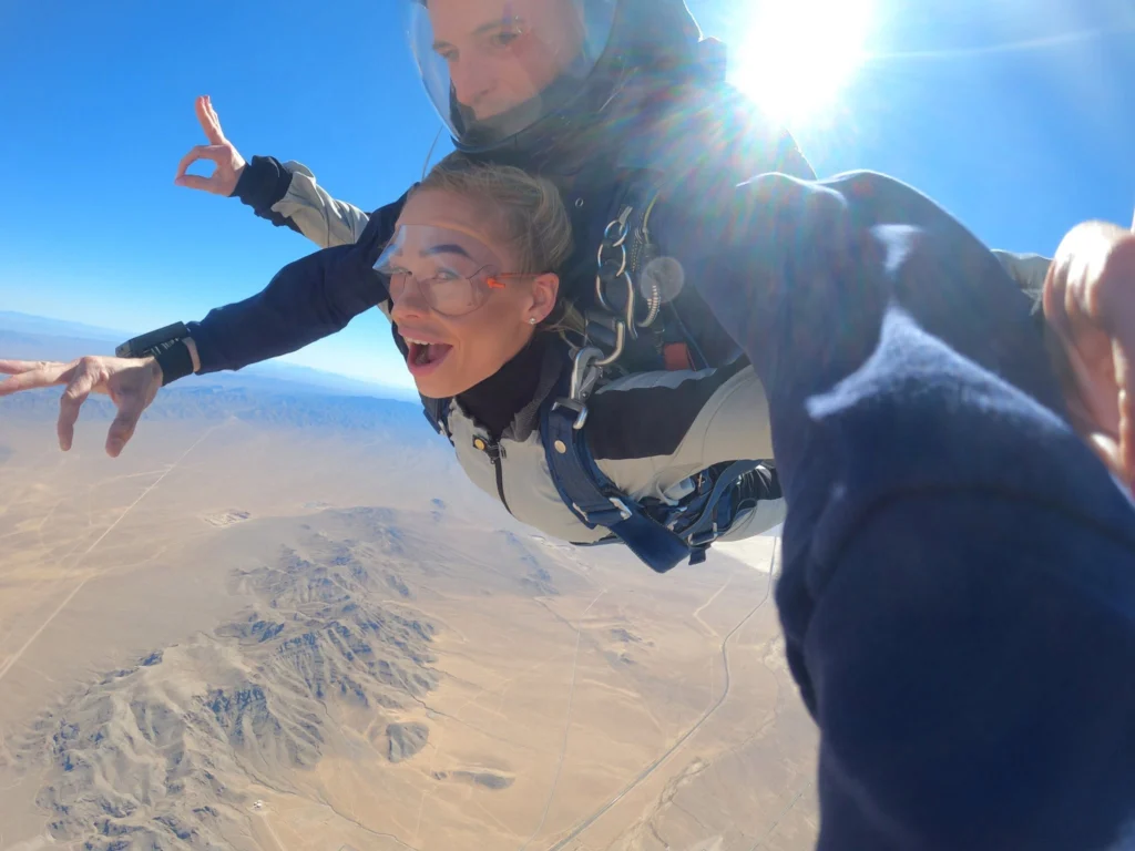Smiling tandem skydiver